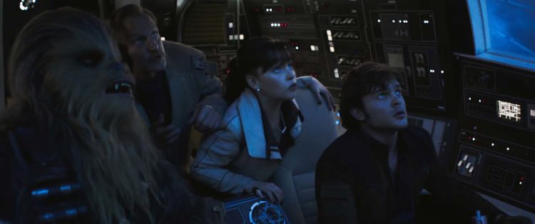 Joonas Suotamo is Chewbacca, Woody Harrelson is Beckett, Emilia Clarke is Qiâ€™ra and Alden Ehrenreich is Han Solo in SOLO: A STAR WARS STORY.